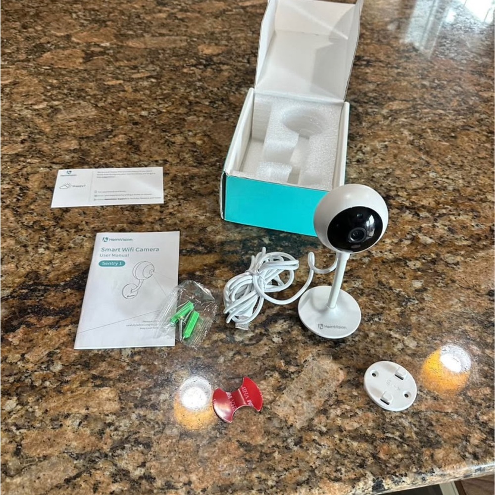 White Smart Home Video Camera with Spherical Design